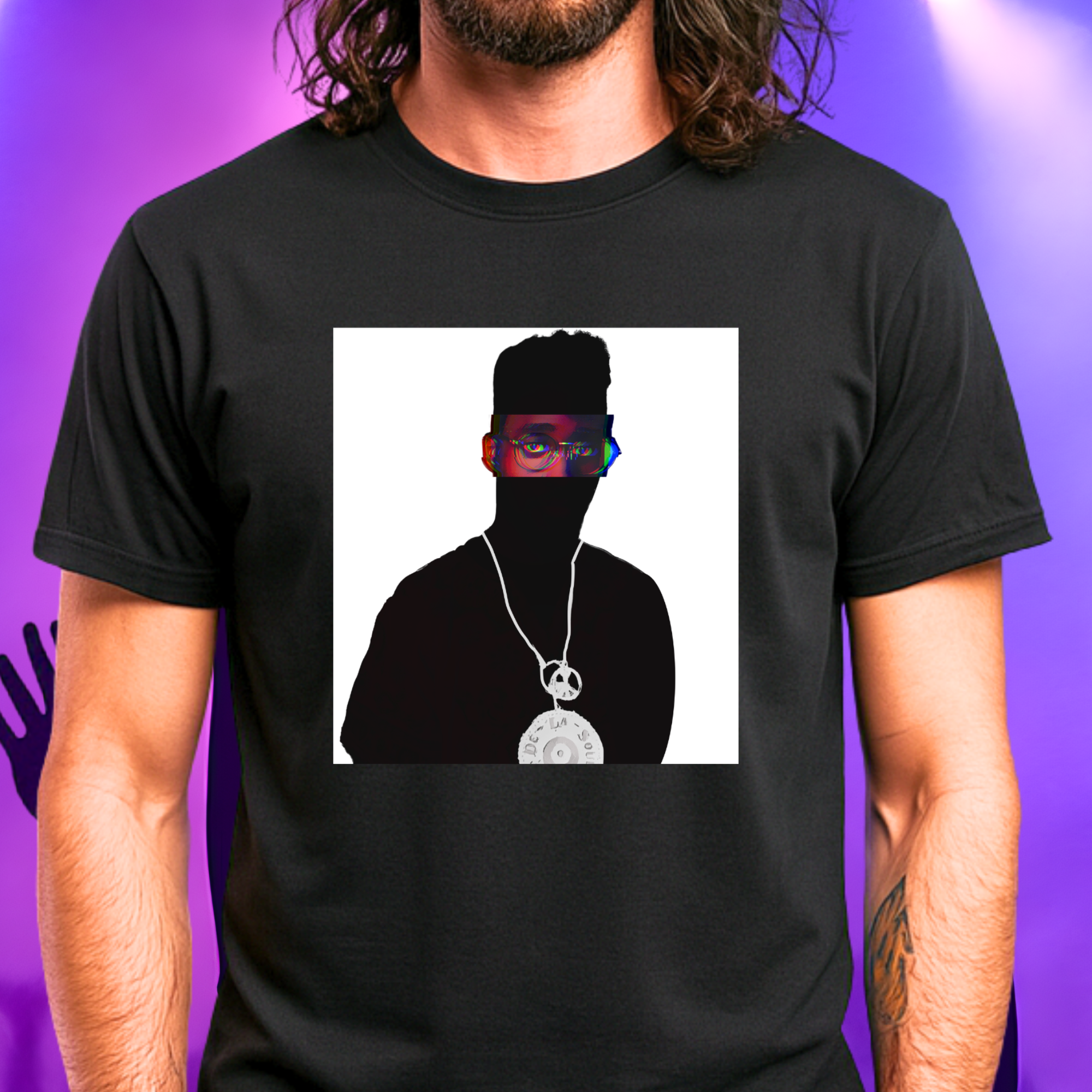 Alternative Hip-Hop music icon graphic t-shirt in black featuring illustrated silhouette portrait design with high-top fade, round glasses, peace medallion and chain - worn by model in concert setting - IconBandwear music icons collection