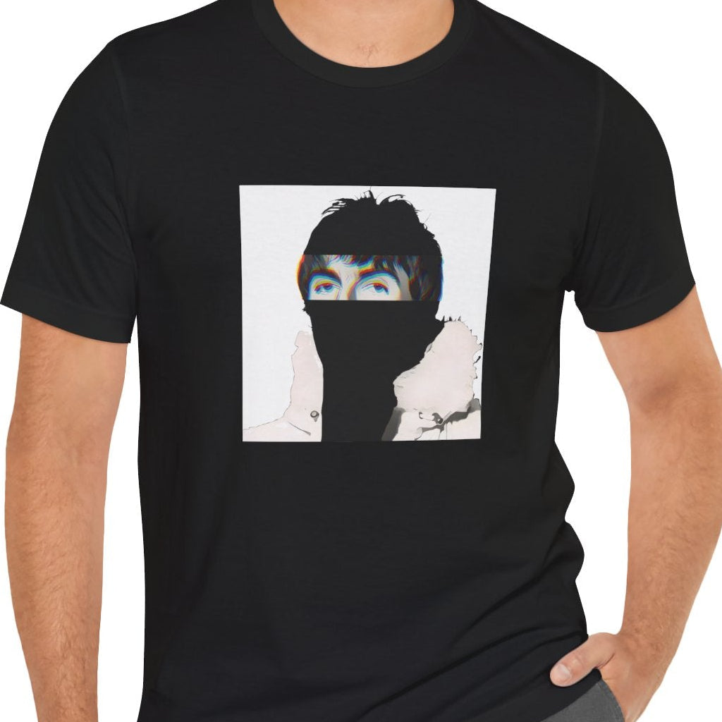 Britpop music icon graphic t-shirt in black featuring illustrated silhouette portrait with tousled dark hair, chromatic glitch effect and white fur-collared parka - worn by model in studio setting - 90s design - IconBandwear music icons collection